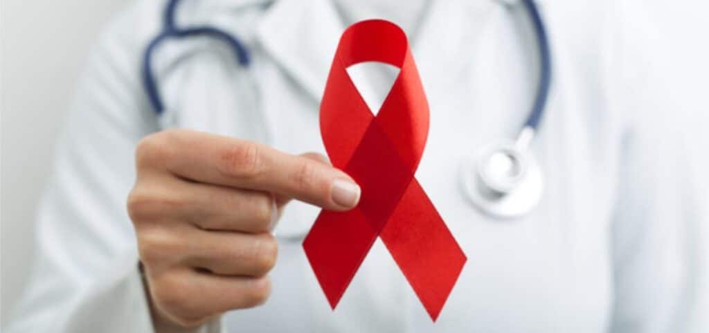 Enfermos de sida denuncian que "cuando interesa" hay vacunas en un año 2 lazo rojo Enfermos de sida denuncian que "cuando interesa" hay vacunas en un año